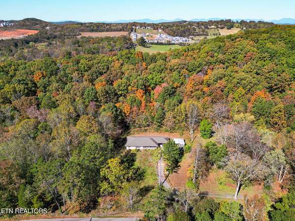 9.85 Acres of Land with Home for Sale in Knoxville, Tennessee