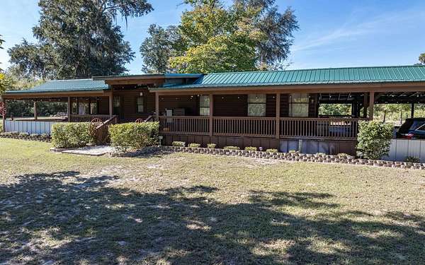 30.4 Acres of Recreational Land with Home for Sale in Fort White, Florida