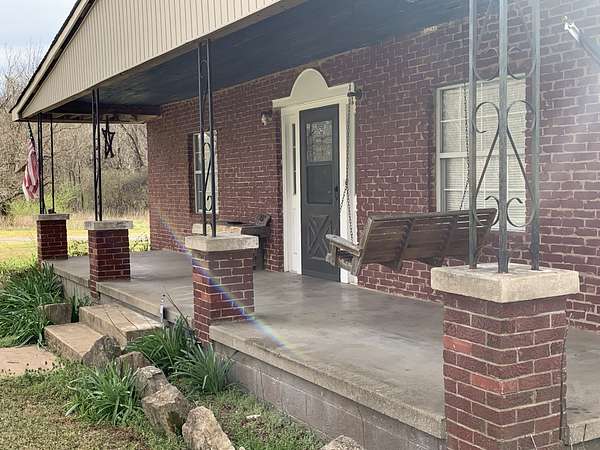 5.8 Acres of Residential Land with Home for Sale in Centerville, Tennessee