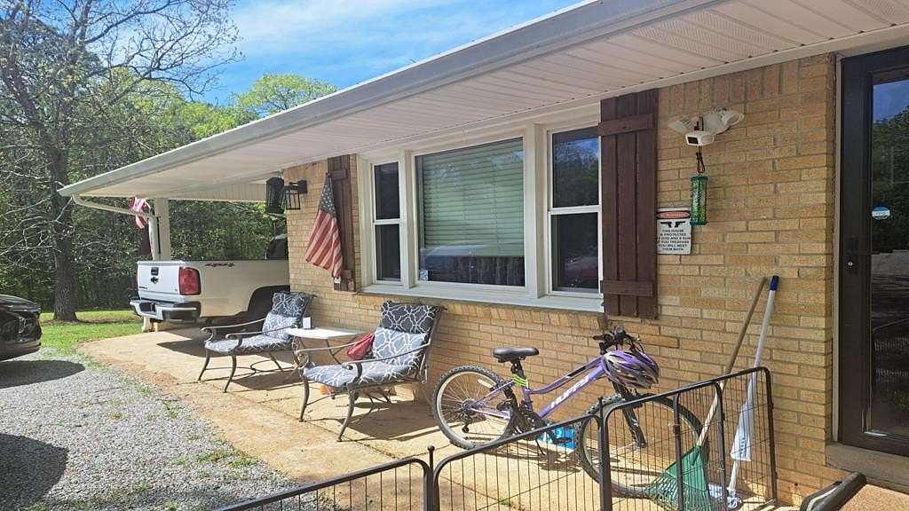 3.1 Acres of Residential Land with Home for Sale in Camden, Tennessee