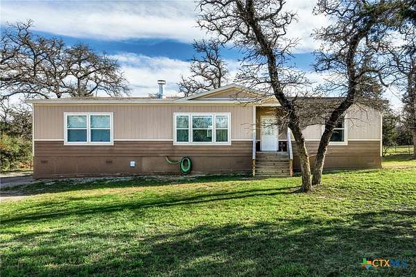 10 Acres of Land with Home for Sale in Luling, Texas