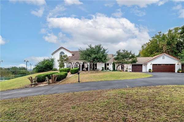 1.77 Acres of Residential Land with Home for Sale in Sallisaw, Oklahoma