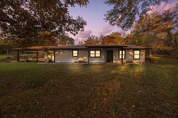 5.9 Acres of Land with Home for Sale in Leoma, Tennessee