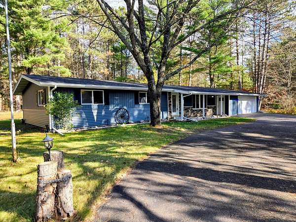 0.22 Acres of Residential Land with Home for Sale in Minocqua, Wisconsin