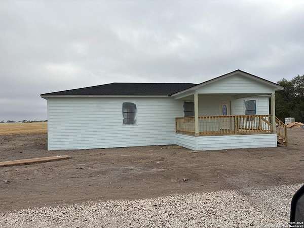 5 Acres of Residential Land with Home for Sale in La Pryor, Texas