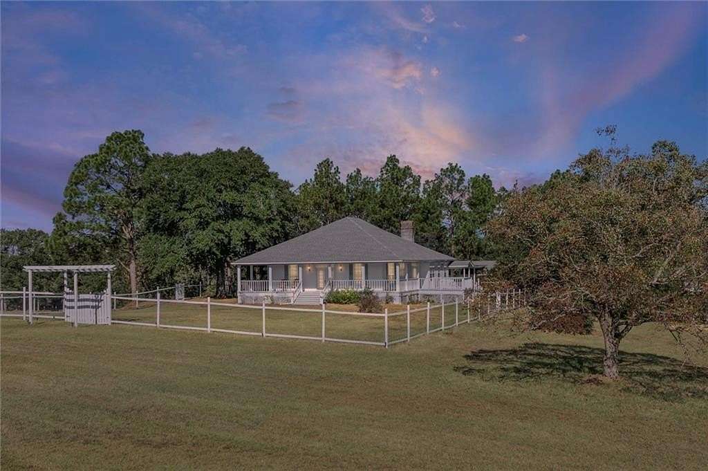 26.6 Acres of Land with Home for Sale in Wilmer, Alabama