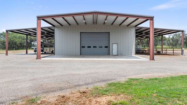 134 Acres of Agricultural Land with Home for Sale in Johnson City, Texas
