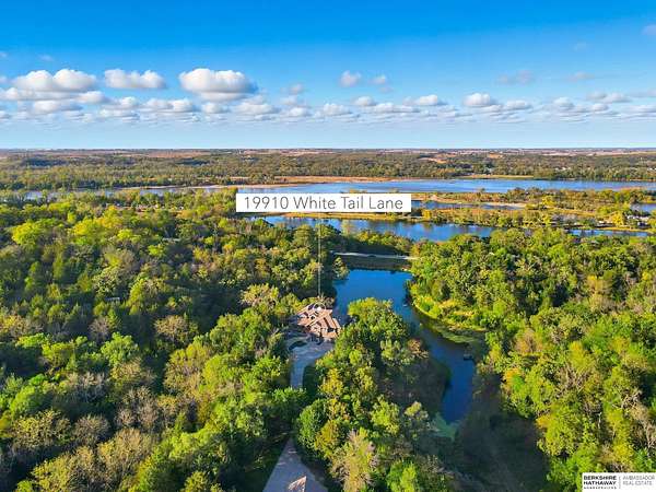 5.7 Acres of Residential Land with Home for Sale in Louisville, Nebraska