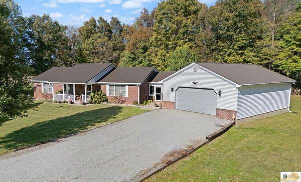 7.12 Acres of Land with Home for Sale in Columbia, Kentucky