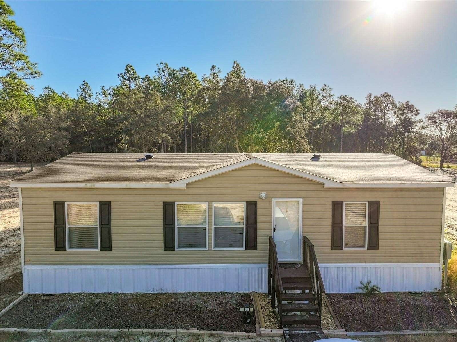 2.5 Acres of Land with Home for Sale in Archer, Florida