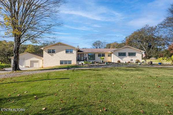 3.85 Acres of Residential Land with Home for Sale in Lenoir City, Tennessee