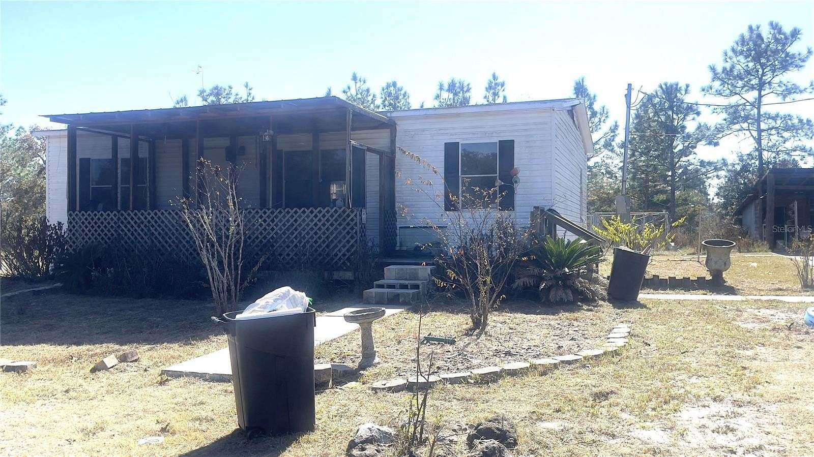 2.5 Acres of Residential Land with Home for Sale in Bronson, Florida