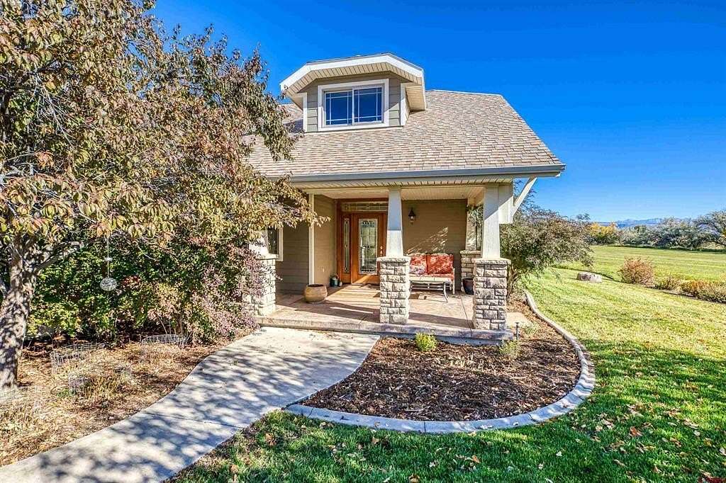 5 Acres of Residential Land with Home for Sale in Hotchkiss, Colorado