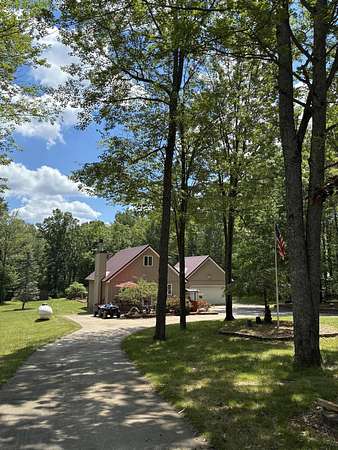 1.74 Acres of Land with Home for Sale in Roscommon, Michigan