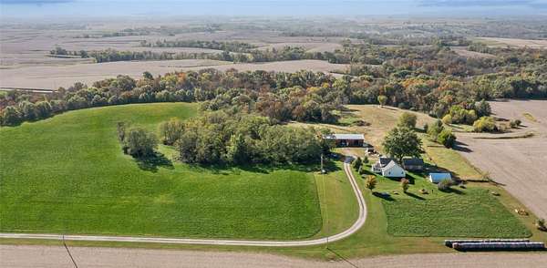 28.5 Acres of Recreational Land with Home for Sale in Knoxville, Iowa