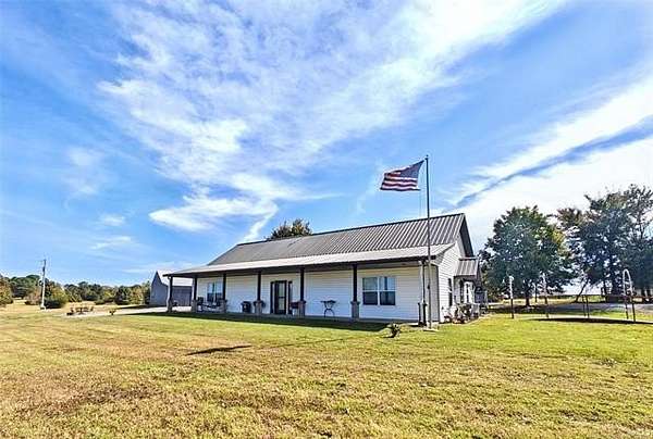 12.3 Acres of Land with Home for Sale in Tahlequah, Oklahoma