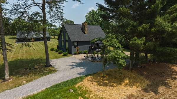 5.2 Acres of Land with Home for Sale in Russell Springs, Kentucky