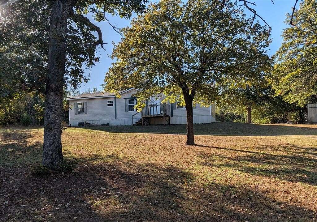 1.56 Acres of Residential Land with Home for Sale in Edmond, Oklahoma