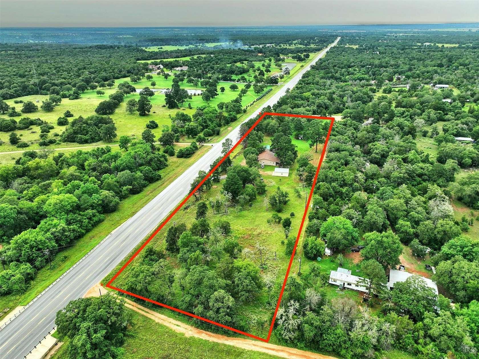 5 Acres of Improved Mixed-Use Land for Sale in Smithville, Texas