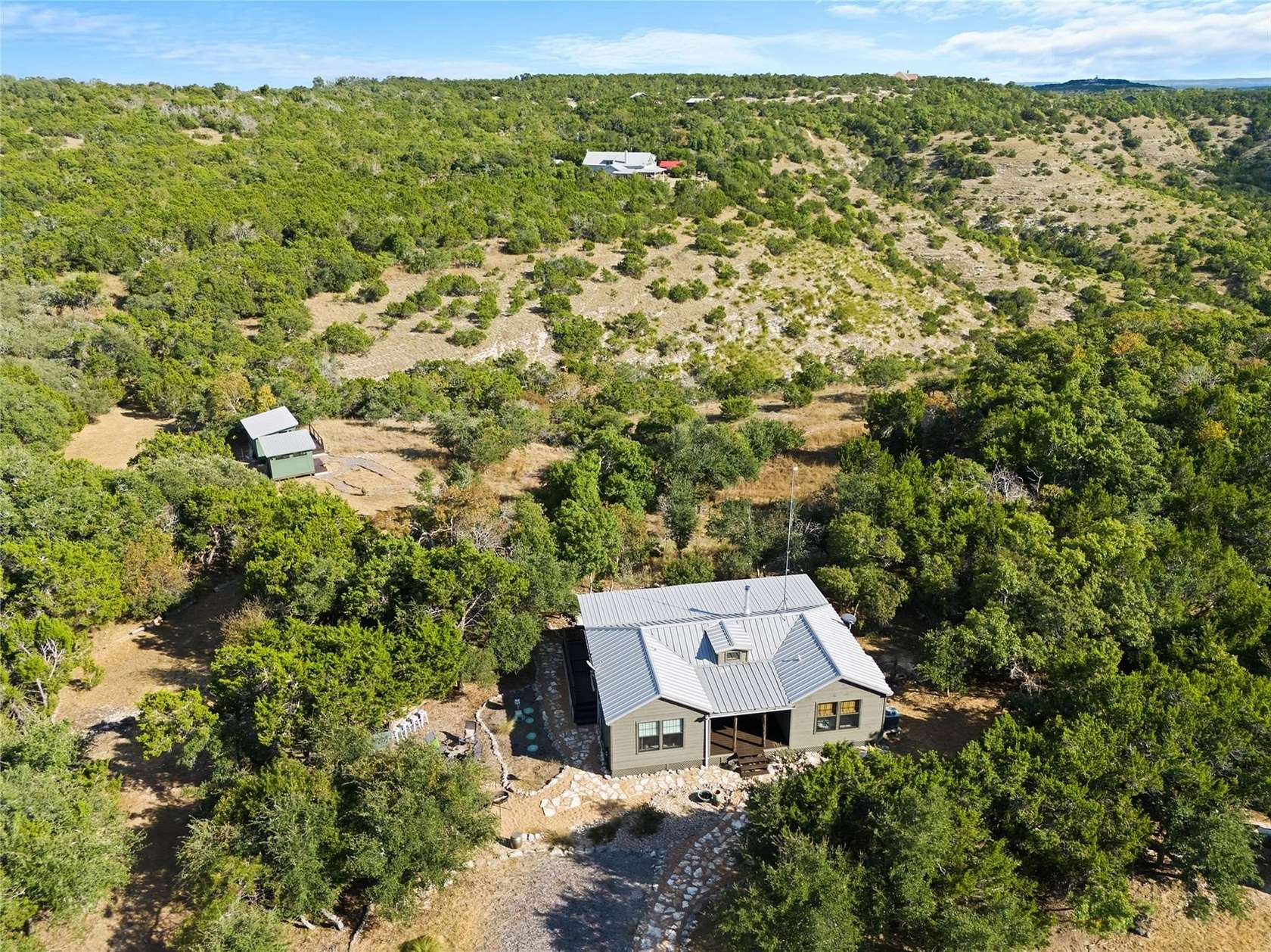 5.86 Acres of Residential Land with Home for Sale in Wimberley, Texas