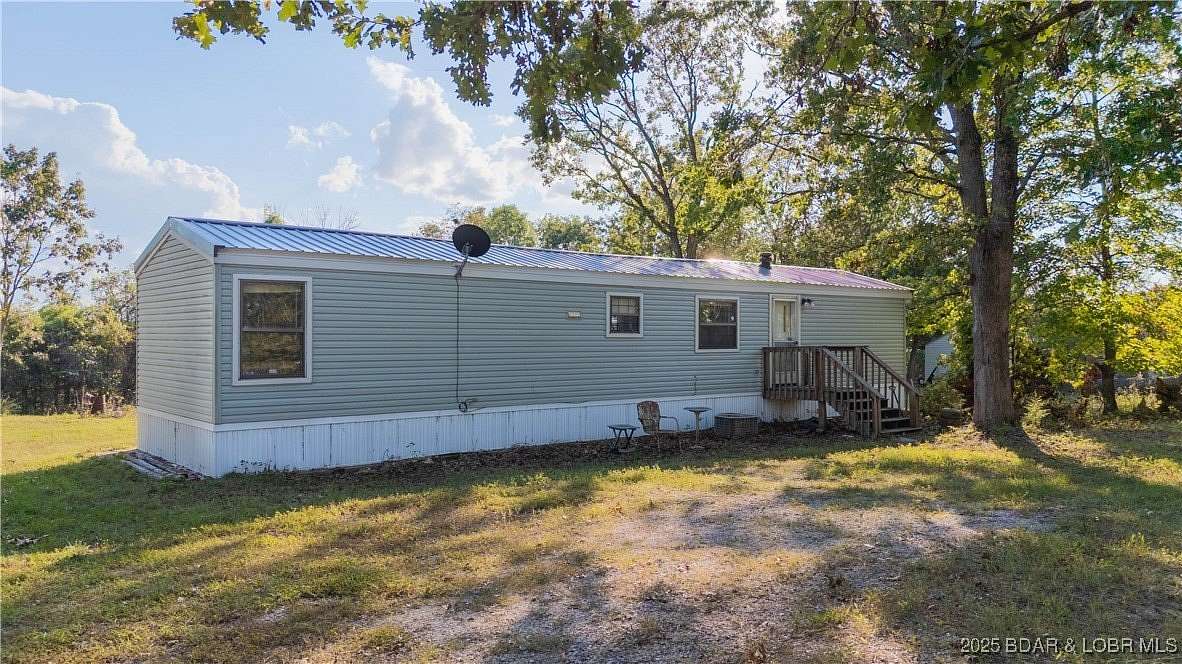 6.37 Acres of Residential Land with Home for Sale in Warsaw, Missouri