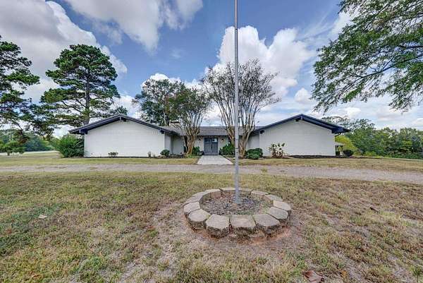 20 Acres of Land with Home for Sale in Naples, Texas