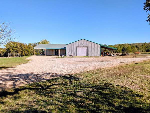 17 Acres of Land with Home for Sale in Cedarcreek, Missouri