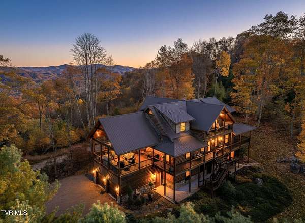 5.3 Acres of Residential Land with Home for Sale in Mountain City, Tennessee