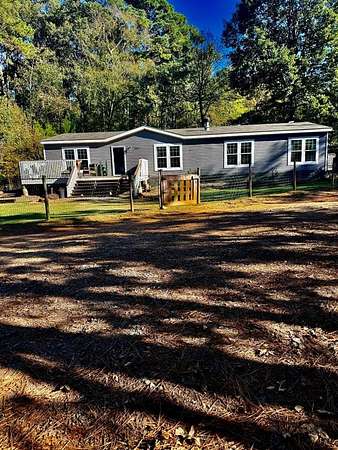 8 Acres of Residential Land with Home for Sale in Maud, Texas