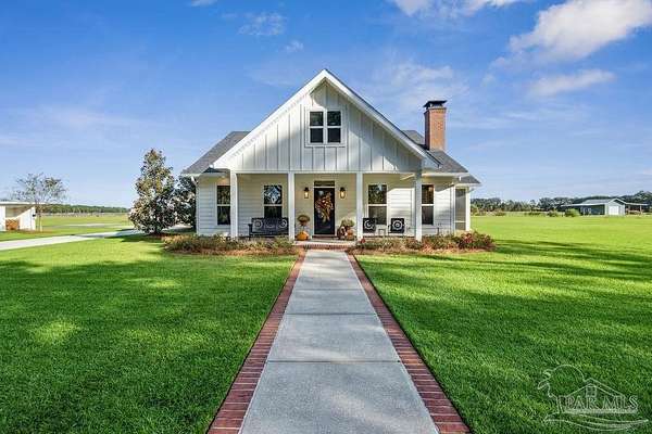 5 Acres of Land with Home for Sale in Pace, Florida