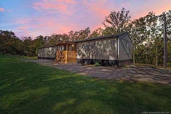 5.5 Acres of Land with Home for Sale in Moyers, Oklahoma