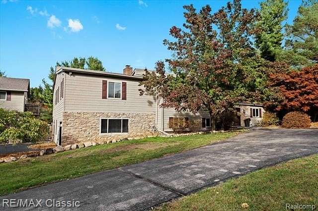 2.12 Acres of Residential Land with Home for Sale in Milford, Michigan