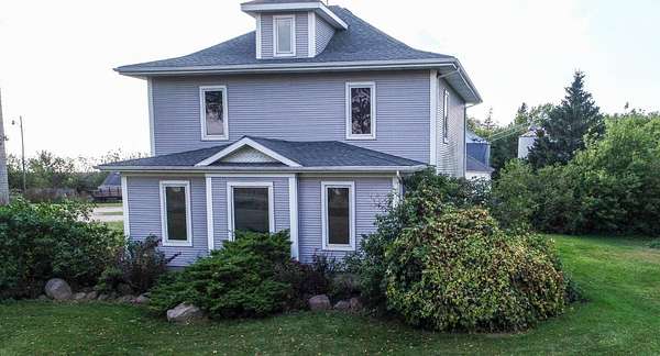 1.5 Acres of Residential Land with Home for Sale in Emmetsburg, Iowa