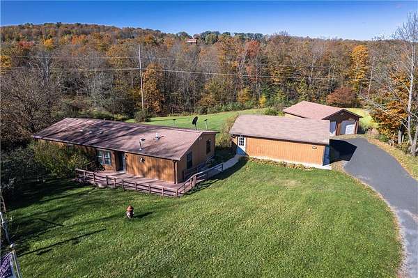 2.13 Acres of Residential Land with Home for Sale in Newfield, New York