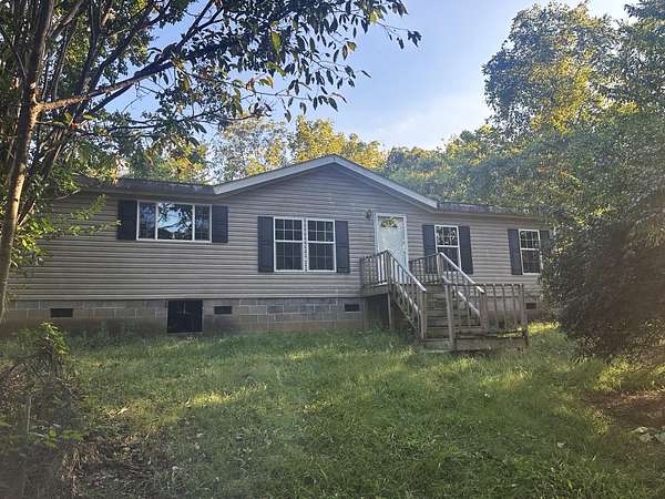 13.4 Acres of Land with Home for Sale in Morristown, Tennessee