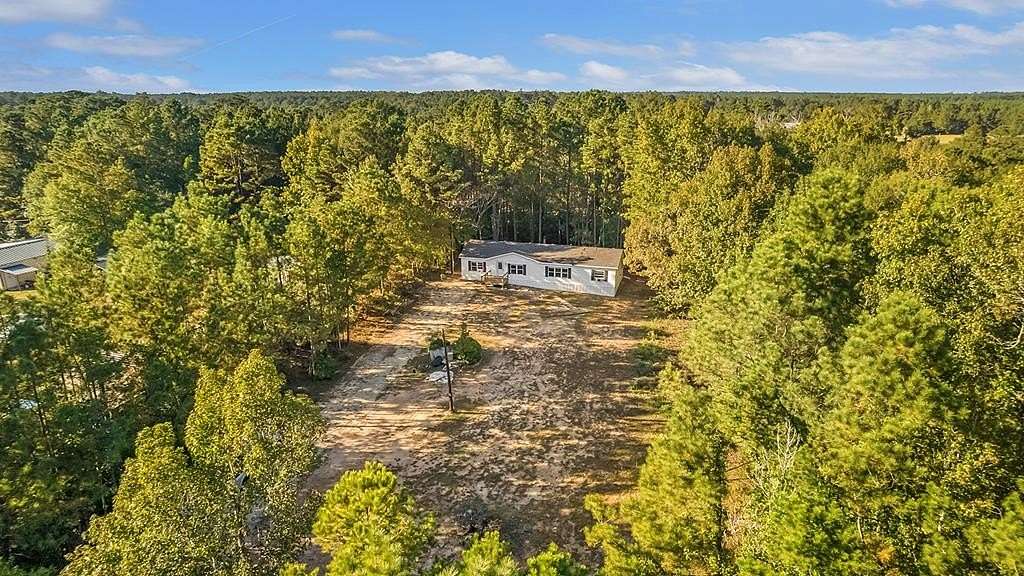 1.87 Acres of Residential Land with Home for Sale in Newton, Texas