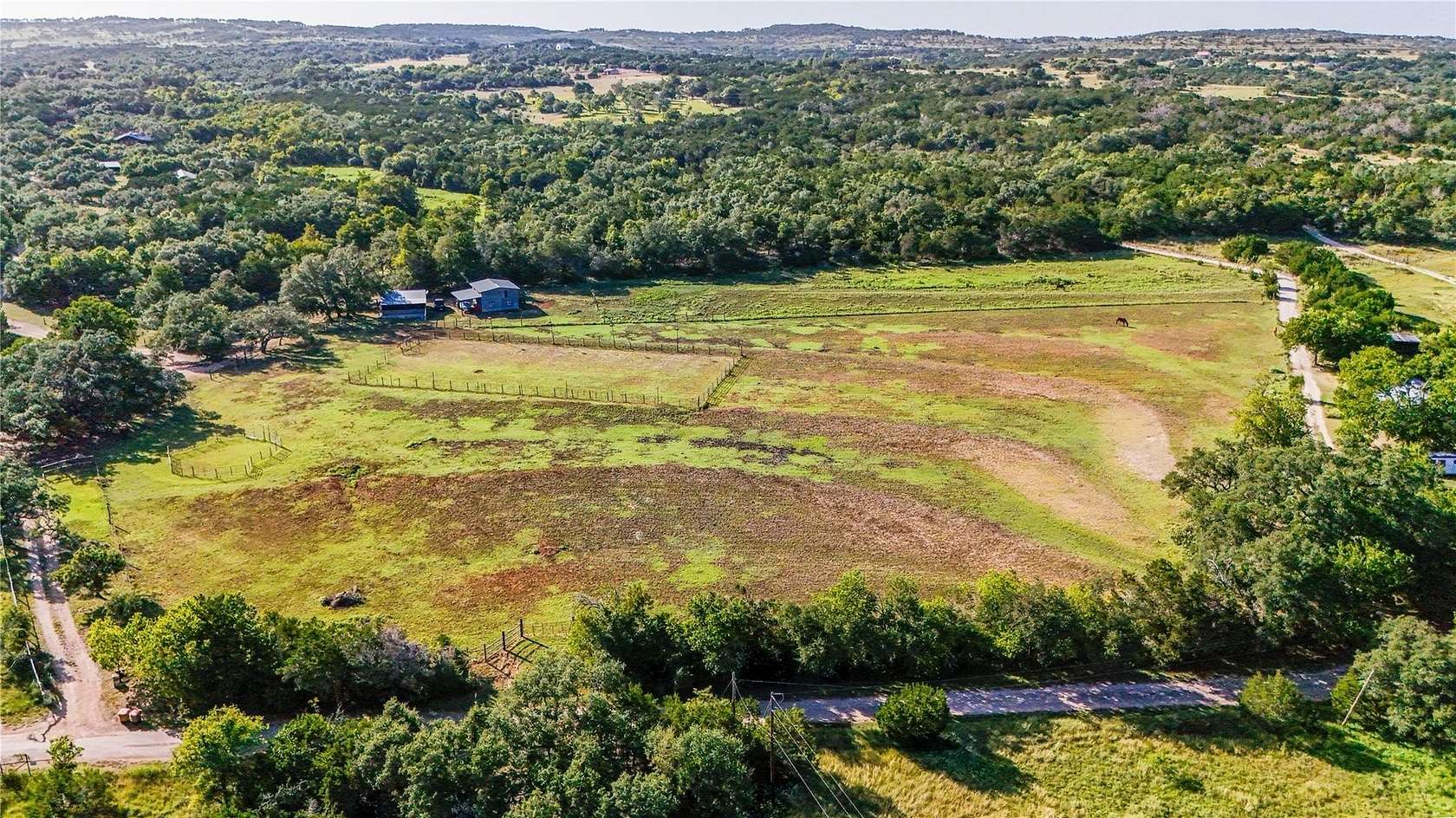 23.2 Acres of Land with Home for Sale in Dripping Springs, Texas