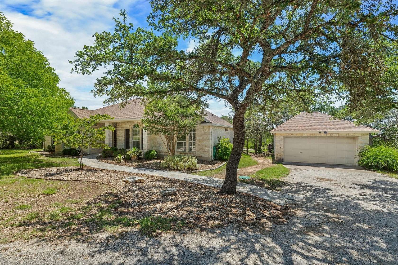 5.33 Acres of Residential Land with Home for Sale in Wimberley, Texas