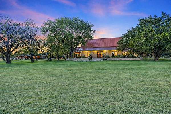8.56 Acres of Land with Home for Sale in Spicewood, Texas