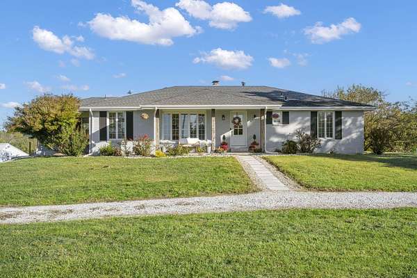 44.8 Acres of Agricultural Land with Home for Sale in Springfield, Missouri