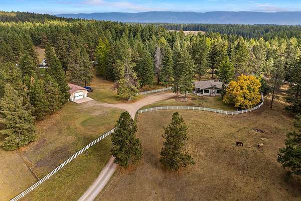 8.9 Acres of Land with Home for Sale in Bigfork, Montana