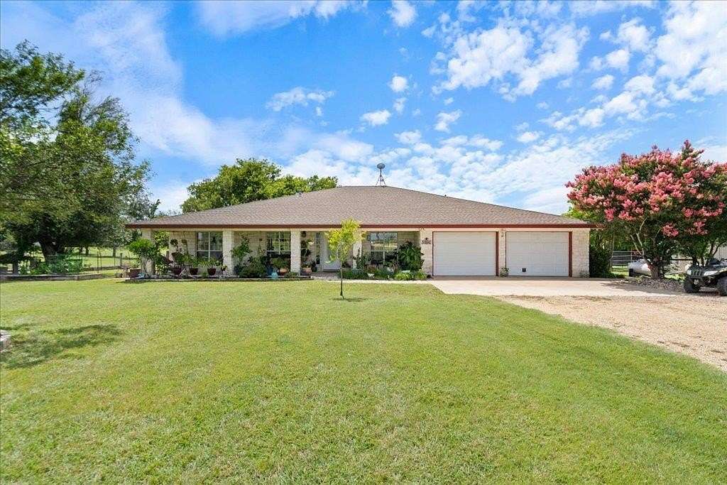 30 Acres of Agricultural Land with Home for Sale in Taylor, Texas