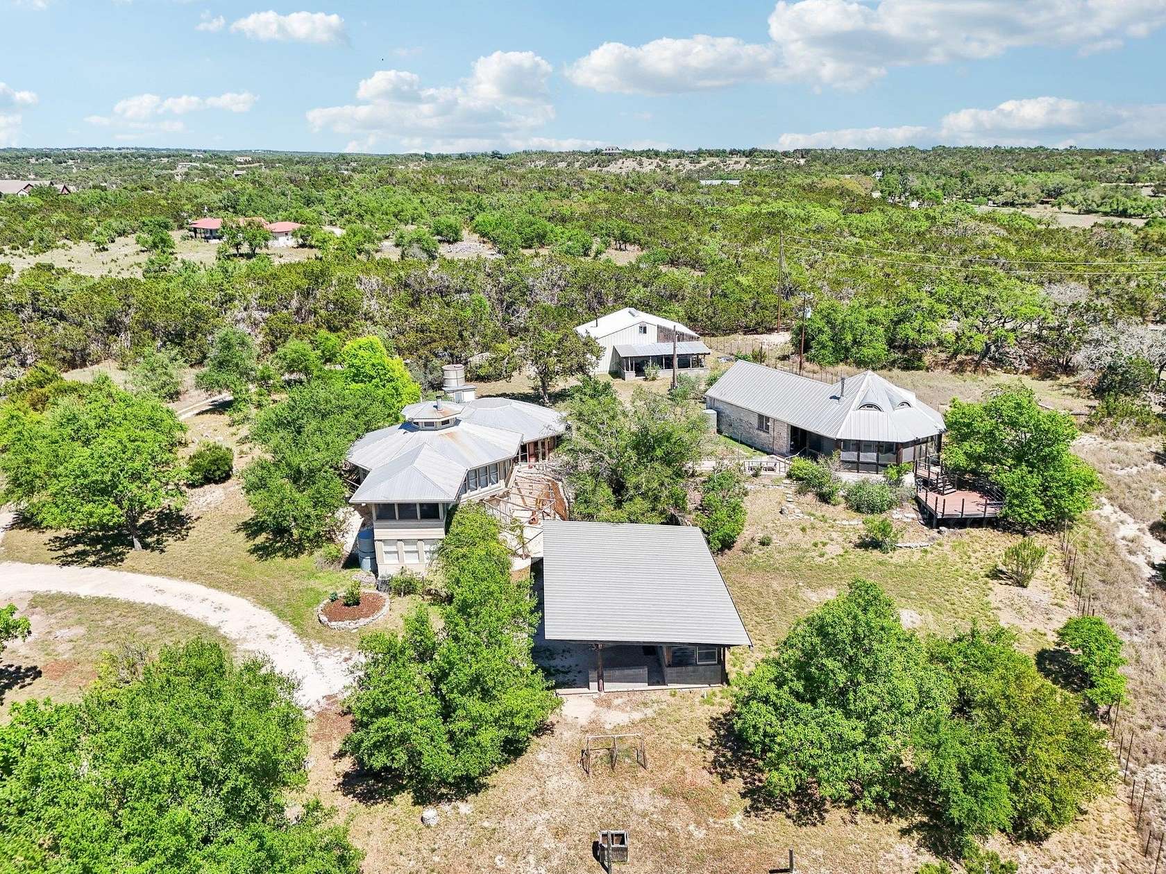 10 Acres of Land with Home for Sale in Dripping Springs, Texas