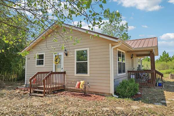 4.17 Acres of Residential Land with Home for Sale in Smithville, Texas