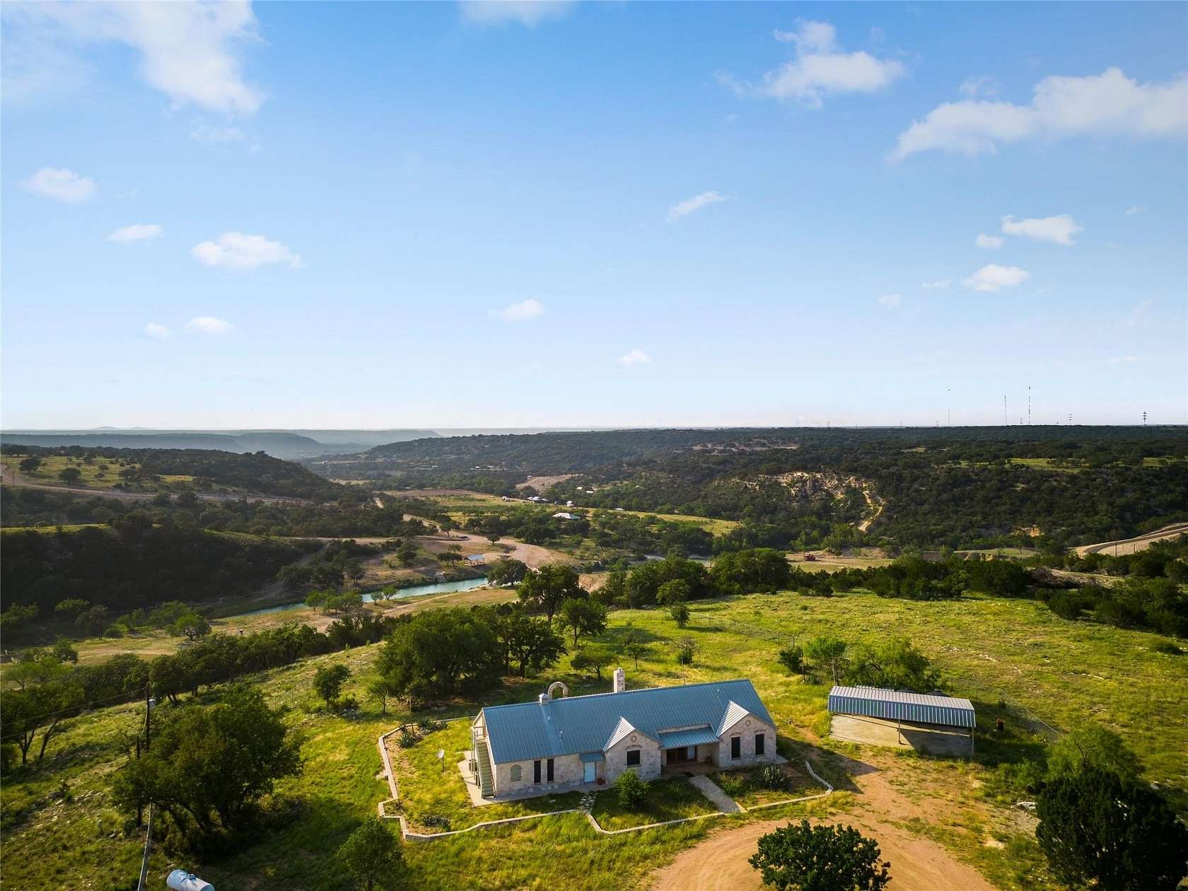 10 Acres of Residential Land with Home for Sale in Junction, Texas