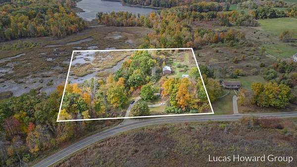 9.68 Acres of Residential Land with Home for Sale in Delton, Michigan