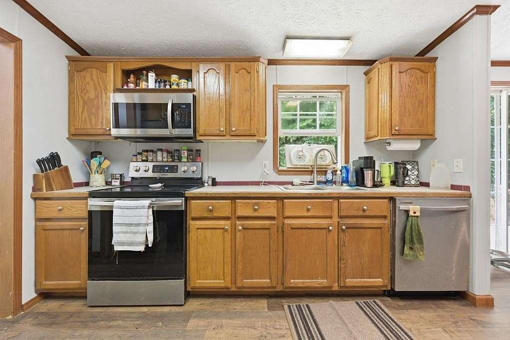 2.16 Acres of Land with Home for Sale in Tuckasegee, North Carolina