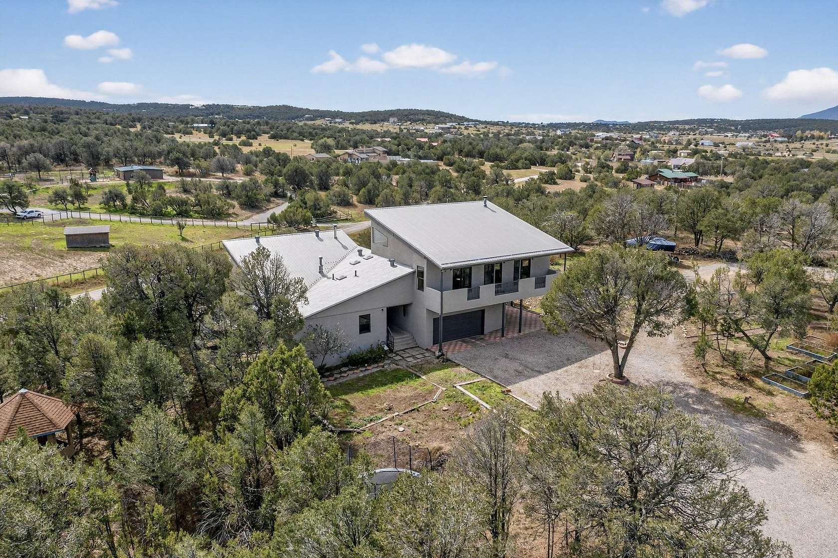 4 Acres of Residential Land with Home for Sale in Sandia Park, New Mexico