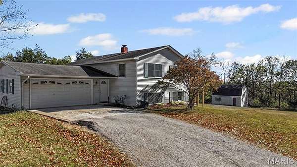 5 Acres of Residential Land with Home for Sale in De Soto, Missouri