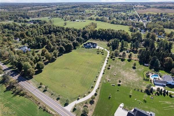 9 Acres of Residential Land with Home for Sale in North Lawrence, Ohio